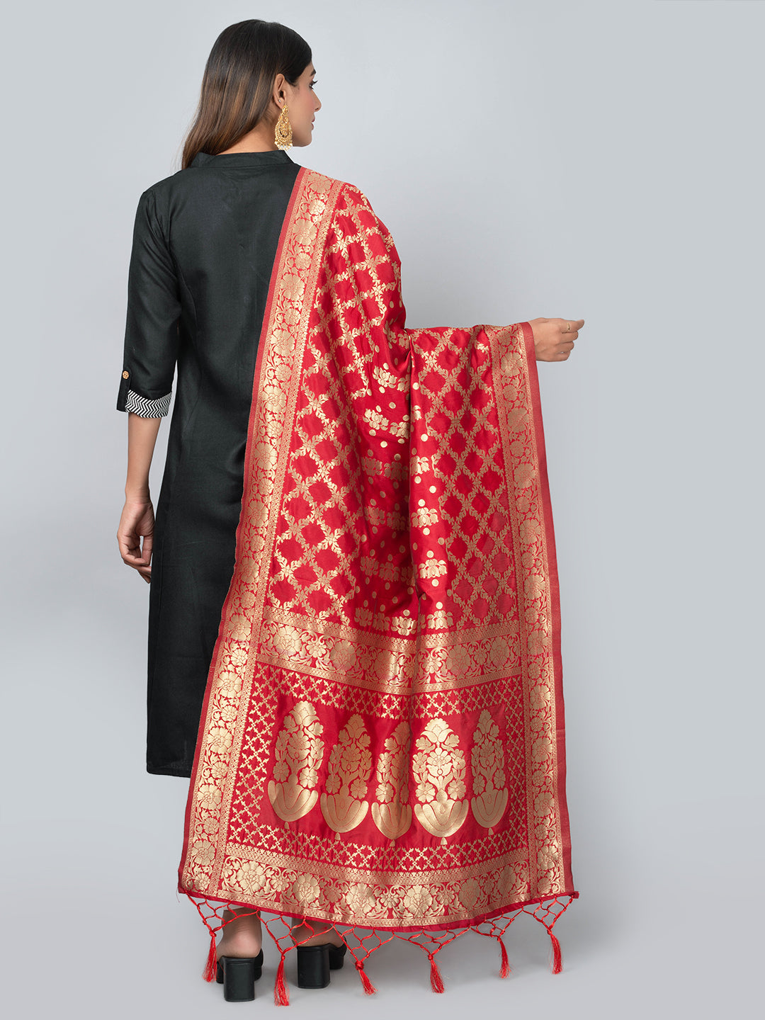 Rich Banarasi jacquard dupatta with intricate woven patterns and traditional motifs, showcasing a luxurious texture—perfect for festive occasions and ethnic wear.