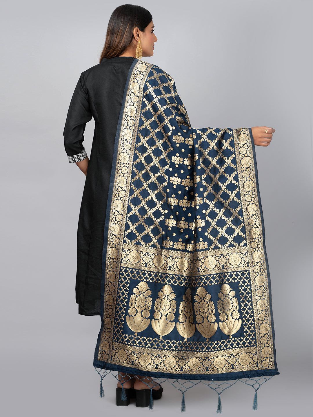Rich Banarasi jacquard dupatta with intricate woven patterns and traditional motifs, showcasing a luxurious texture—perfect for festive occasions and ethnic wear.