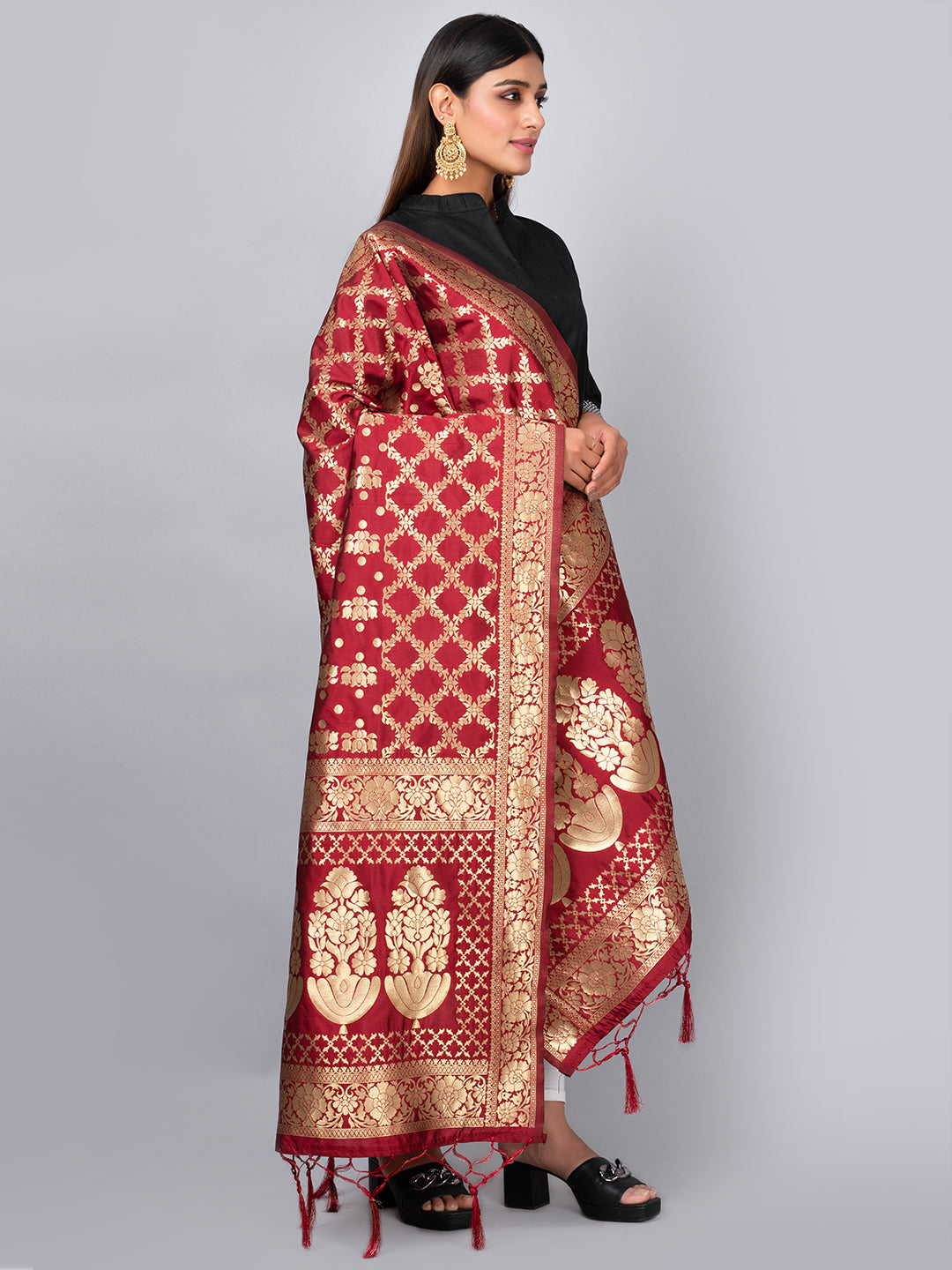 Rich Banarasi jacquard dupatta with intricate woven patterns and traditional motifs, showcasing a luxurious texture—perfect for festive occasions and ethnic wear.