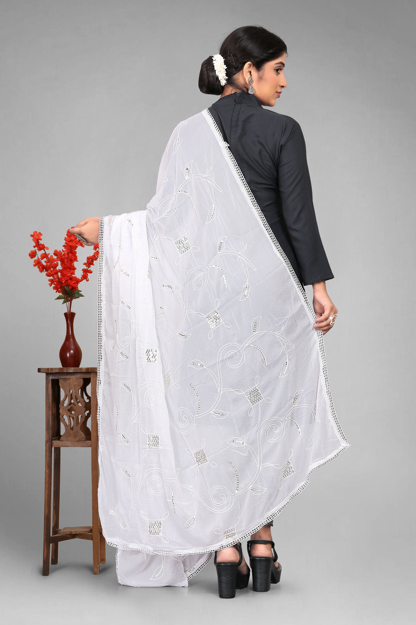 Chiffon dyeable dupatta with delicate sequin embroidery, showcasing a soft, sheer texture and elegant sparkle—ideal for custom dyeing, festive wear, and ethnic styling.
