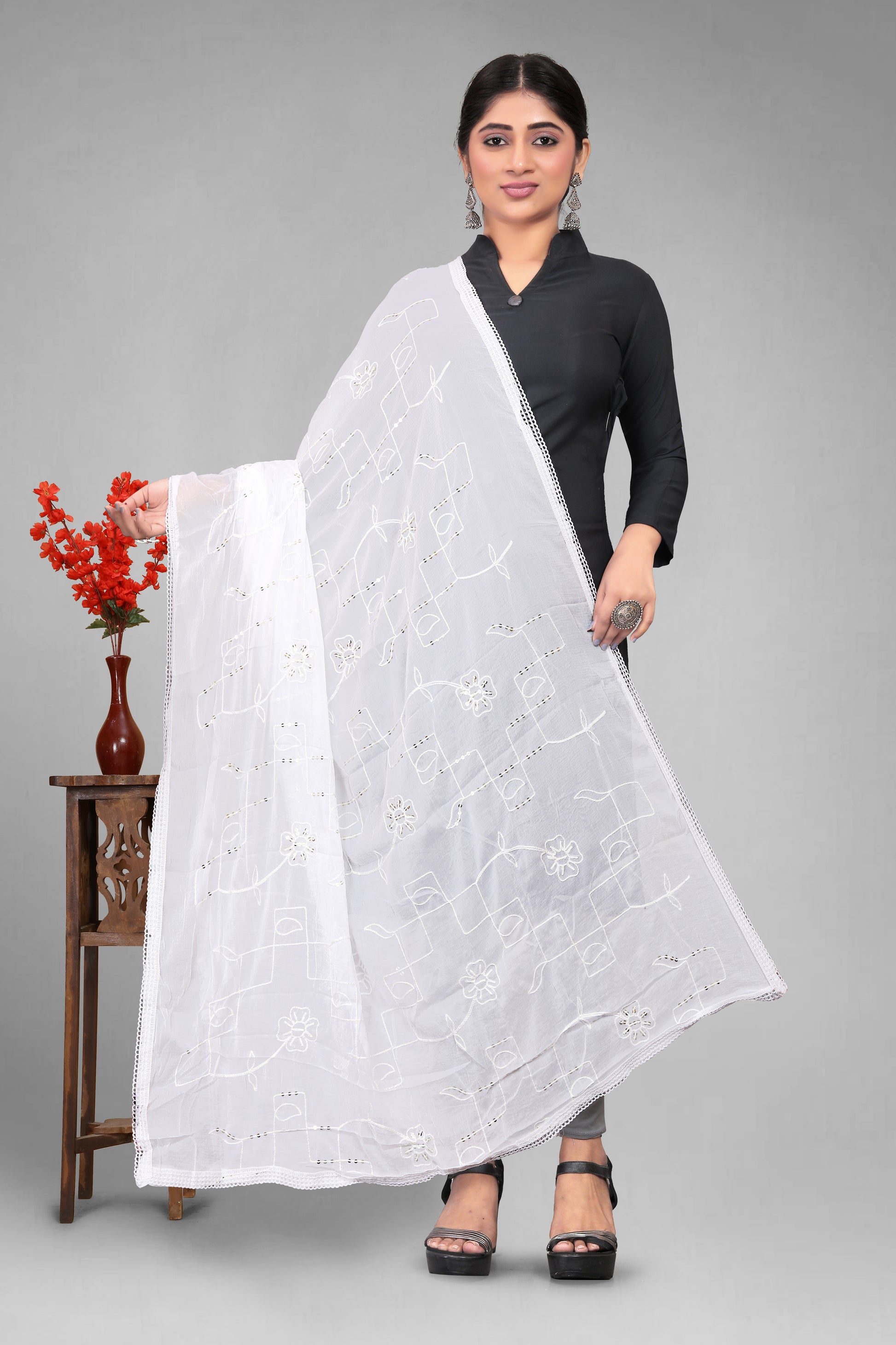Chiffon dyeable dupatta with delicate sequin embroidery, showcasing a soft, sheer texture and elegant sparkle—ideal for custom dyeing, festive wear, and ethnic styling.