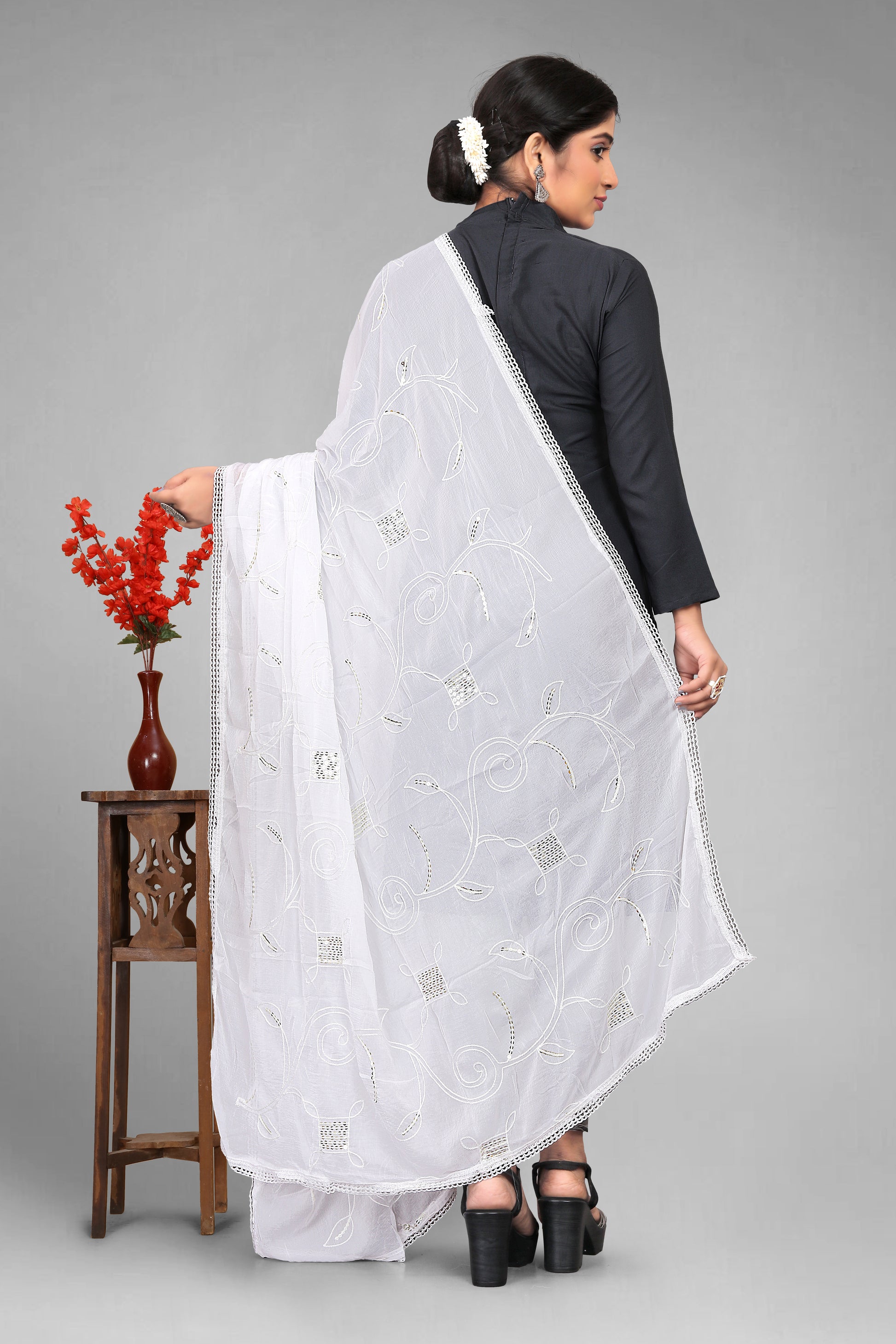 Chiffon dyeable dupatta with delicate sequin embroidery, showcasing a soft, sheer texture and elegant sparkle—ideal for custom dyeing, festive wear, and ethnic styling.